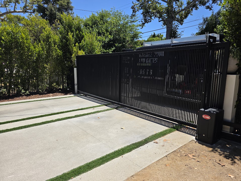 SGD Services Review v1 7 Studio City. Vertical-slat sliding gate with All-O-Matic SL100 DC gate motor.