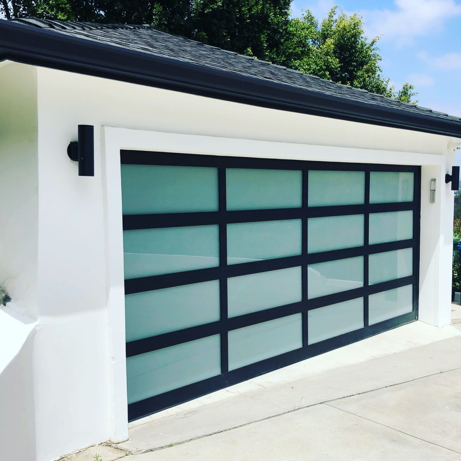 SGD Service Areas Review v2 3 Hollywood Hills. Garage door, full view, laminated glass with aluminum, LiftMaster jackshaft opener.
